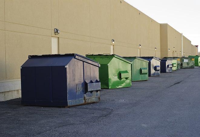 construction-grade dumpsters ready for use in Deer Park